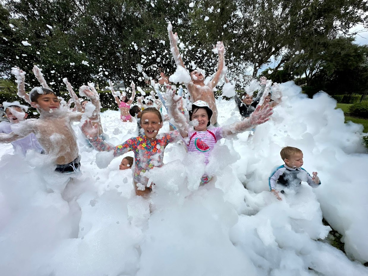 Backyard foam party rental in action